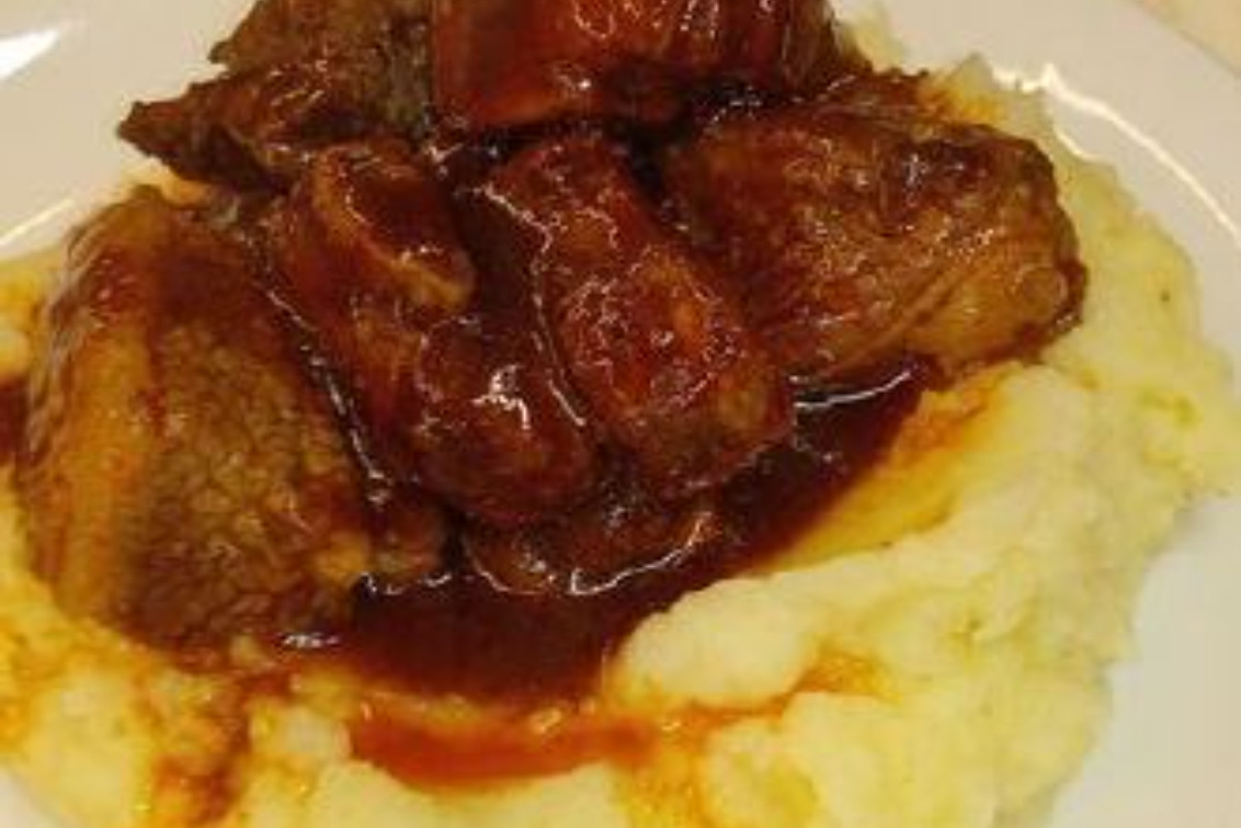 CERDO EXQUISITO EN REDUCCIÓN